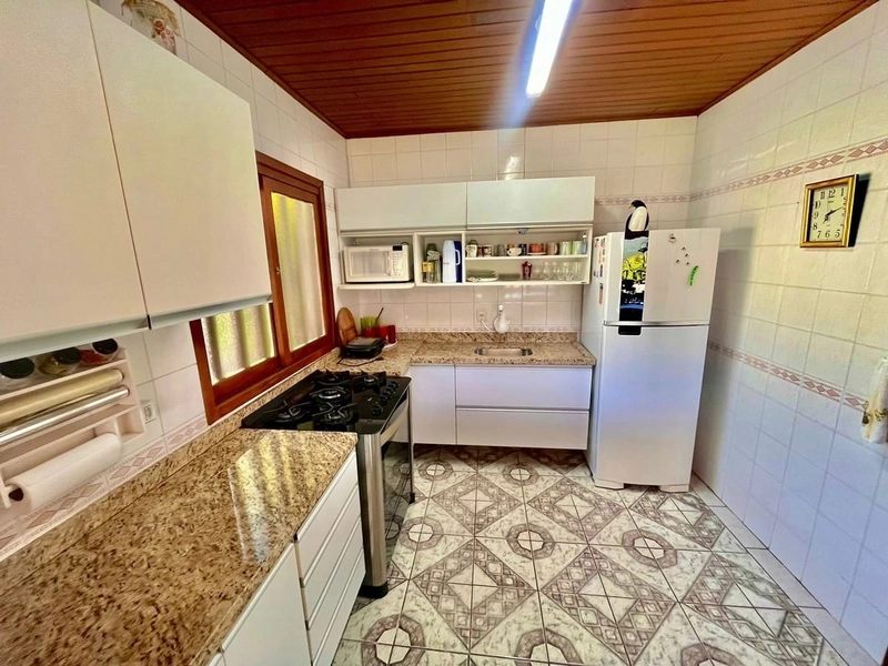 Casa com Suíte, Churrasqueira e Living Integrado: 21ª foto da galeria de imagens do imóvel
