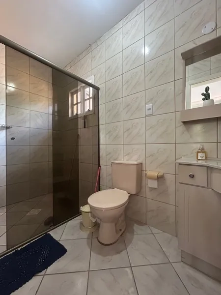 Casa com Pátio Amplo, Churrasqueira e Ar-Condicionado: 9ª foto da galeria de imagens do imóvel