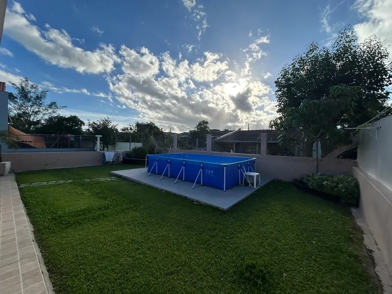 Casa com 3 Dormitórios, Amplo Pátio Fechado e Espaço Gourmet: 17ª foto da galeria de imagens do imóvel