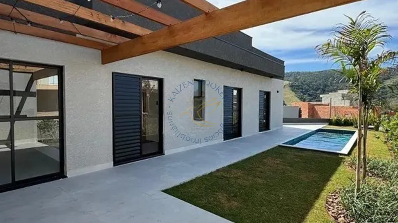 Casa à venda no Portal da Serra em Bragança Paulista. 6 dormitórios, 3 suítes, piscina, área gourmet, vista para montanhas e segurança em condomínio fechado.: 11ª foto da galeria de imagens do imóvel