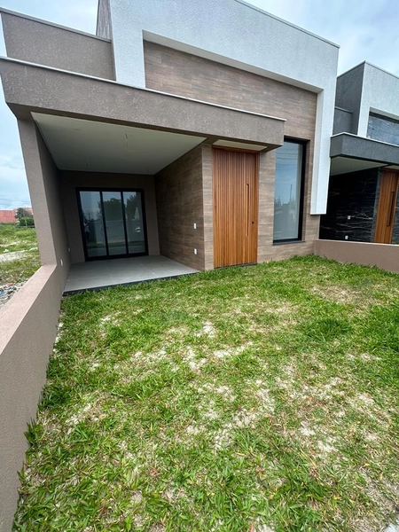 Casa 3 dormitórios sendo 1 suíte americana  em CAPÃO DA CANOA/Zona Nor: 10ª foto da galeria de imagens do imóvel