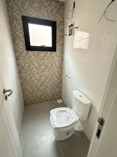 Casa 3 dormitórios sendo 1 suíte americana  em CAPÃO DA CANOA/Zona Nor: 4ª foto da galeria de imagens do imóvel