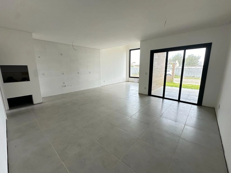 Casa 3 dormitórios sendo 1 suíte americana  em CAPÃO DA CANOA/Zona Nor: 6ª foto da galeria de imagens do imóvel