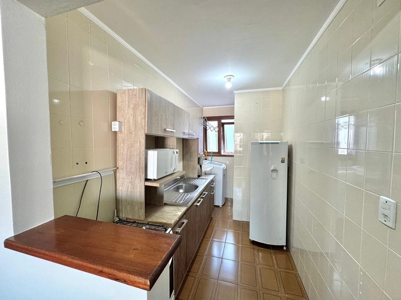 APARTAMENTO EM CAPÃO DA CANOA: 3ª foto da galeria de imagens do imóvel