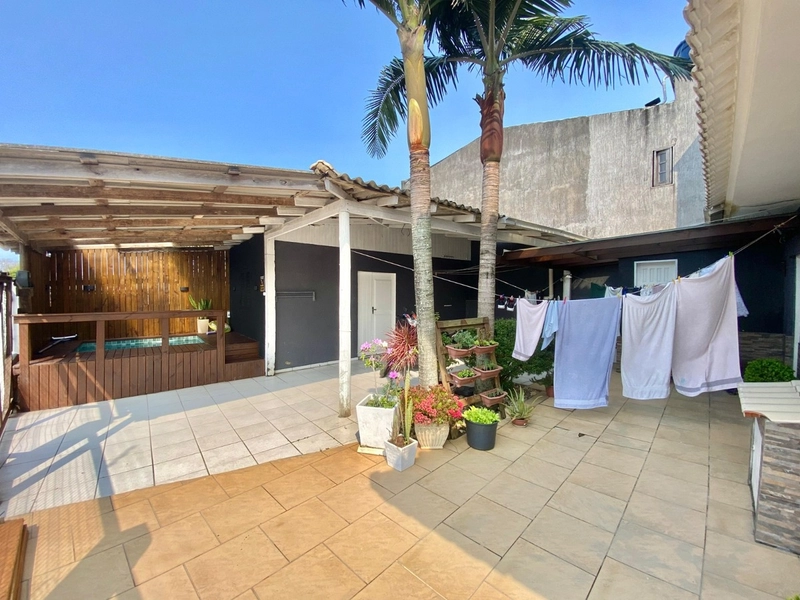 Casa 4 dormitórios em CAPÃO DA CANOA: 14ª foto da galeria de imagens do imóvel