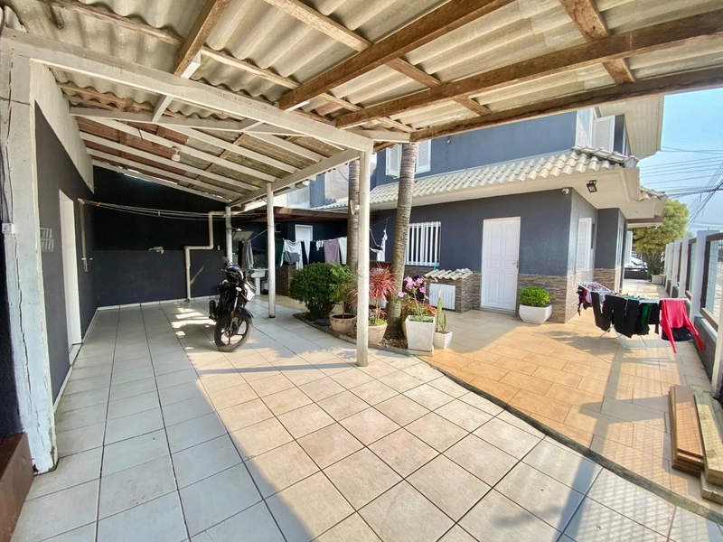 Casa 4 dormitórios em CAPÃO DA CANOA: 3ª foto da galeria de imagens do imóvel