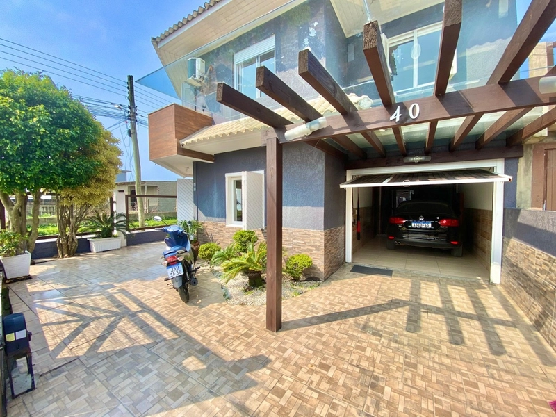 Casa 4 dormitórios em CAPÃO DA CANOA: 12ª foto da galeria de imagens do imóvel