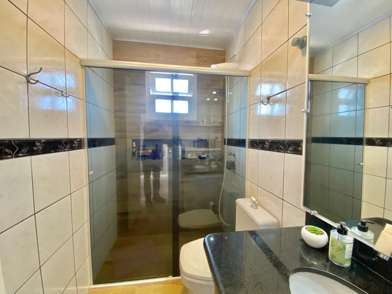 Casa 4 dormitórios em CAPÃO DA CANOA: 5ª foto da galeria de imagens do imóvel