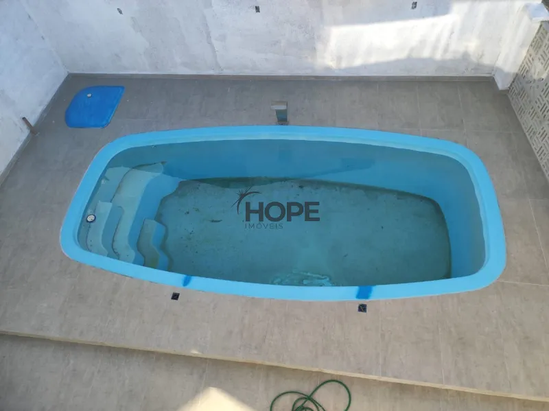 Casa com 4 dormitórios e piscina em Capão da Canoa: 1ª foto da galeria de imagens do imóvel
