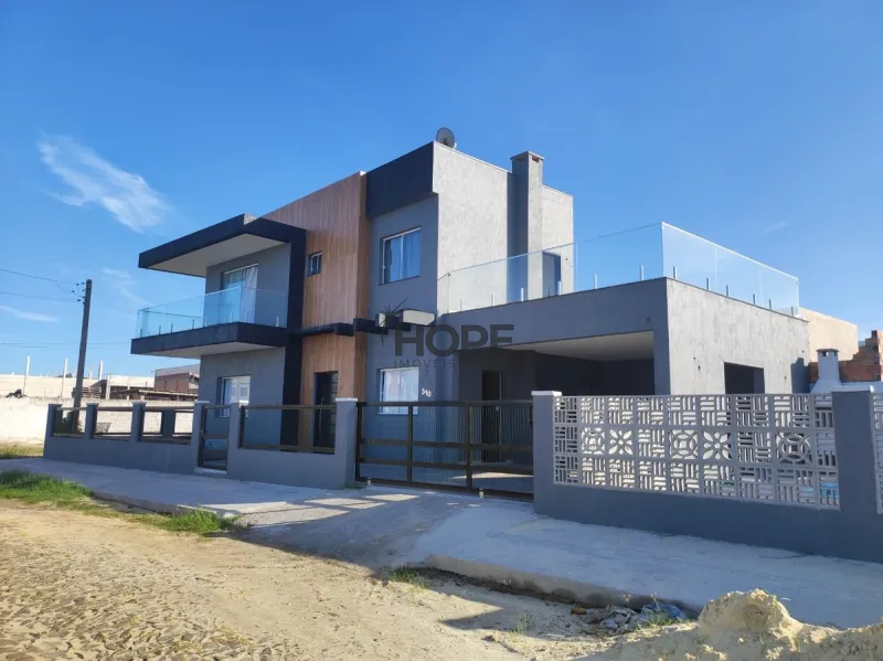 Casa com 4 dormitórios e piscina em Capão da Canoa: 10ª foto da galeria de imagens do imóvel