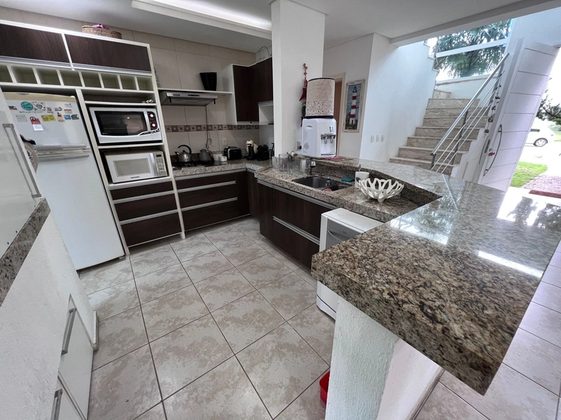 CASA  EM CONDOMÍNIO FECHADO / XANGRI-LÁ: 1ª foto da galeria de imagens do imóvel