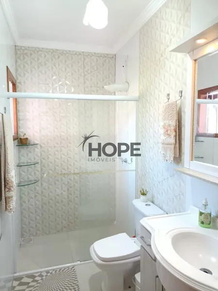 Casa com dois dormitórios e piscina em bairro de Capão da Canoa: 5ª foto da galeria de imagens do imóvel