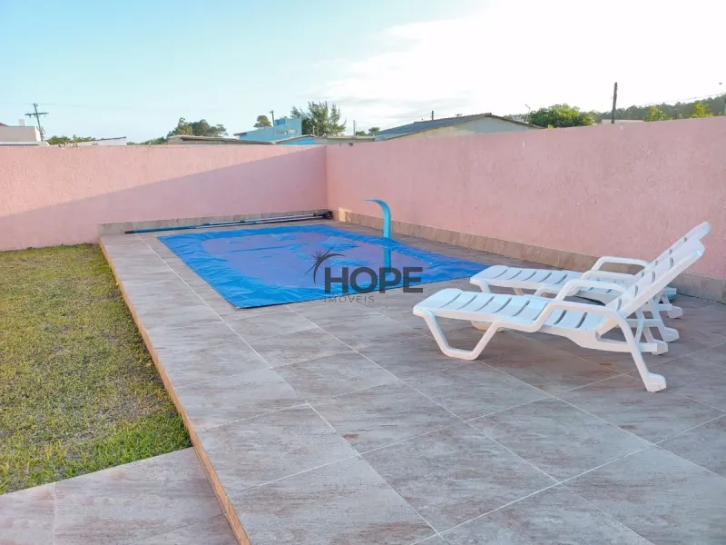 Casa com dois dormitórios e piscina em bairro de Capão da Canoa: 7ª foto da galeria de imagens do imóvel