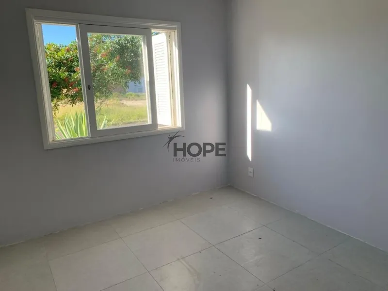 Casa com quatro dormitórios em bairro de Capão da Canoa: 3ª foto da galeria de imagens do imóvel