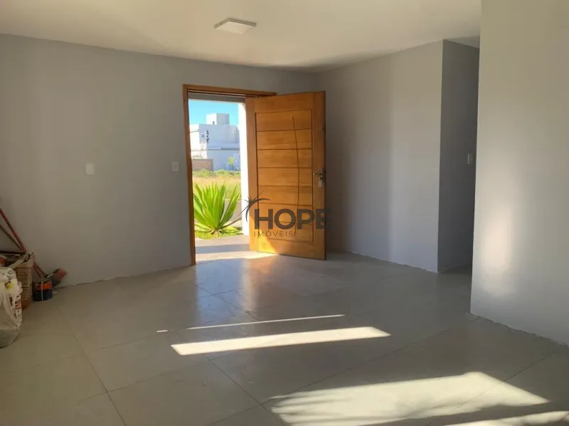 Casa com quatro dormitórios em bairro de Capão da Canoa: 2ª foto da galeria de imagens do imóvel