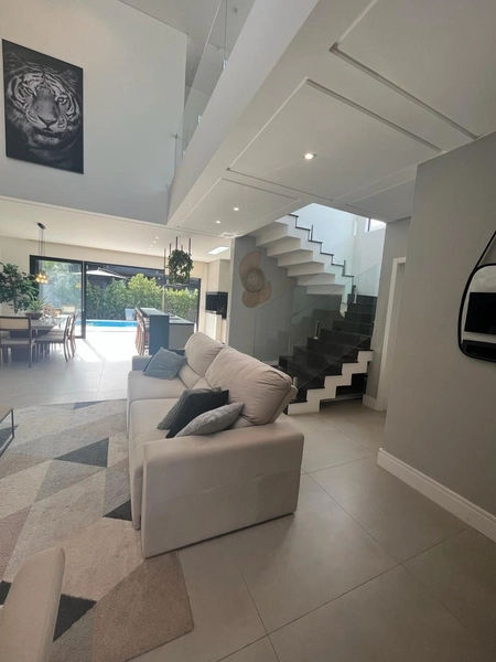 Casa com quatro suítes em condomínio de Xangri-lá: 9ª foto da galeria de imagens do imóvel