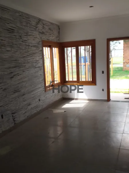 Casa com dois dormitórios, sendo um suíte em bairro de Xangri-lá: 2ª foto da galeria de imagens do imóvel
