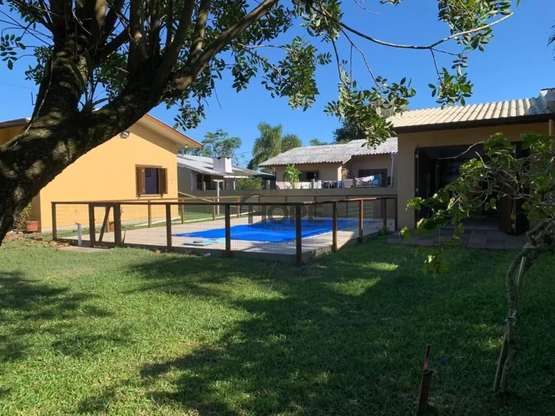 Casa com 3 dormitórios, sendo uma suíte em bairro de Capão da Canoa: 8ª foto da galeria de imagens do imóvel