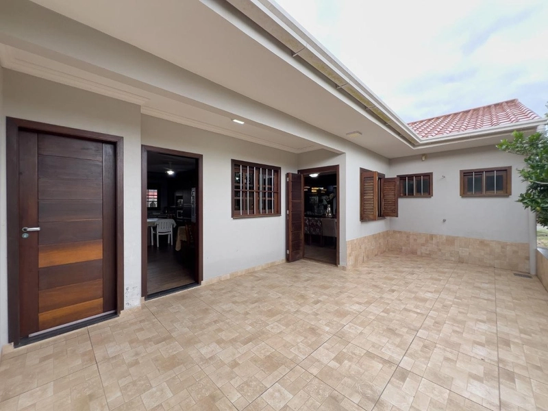 Casa com 3 dormitórios sendo duas suítes à venda em Capão da Canoa: 2ª foto da galeria de imagens do imóvel