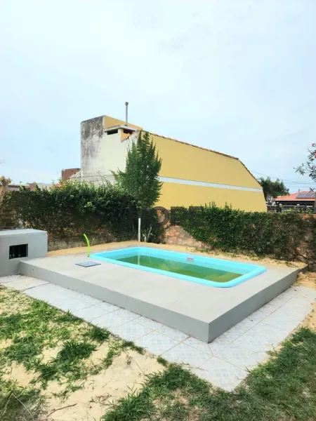 Casa com 4 dormitórios, sendo 2 suítes em Capão da Canoa: 8ª foto da galeria de imagens do imóvel