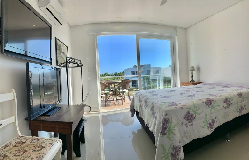 CASA EM CONDOMÍNIO EM XANGRI-LÁ: 6ª foto da galeria de imagens do imóvel