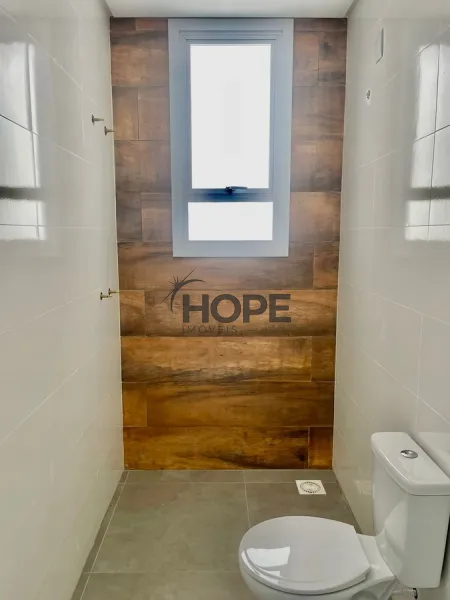 Casa com 3 dormitórios, sendo um suíte em bairro de Capão da Canoa: 2ª foto da galeria de imagens do imóvel
