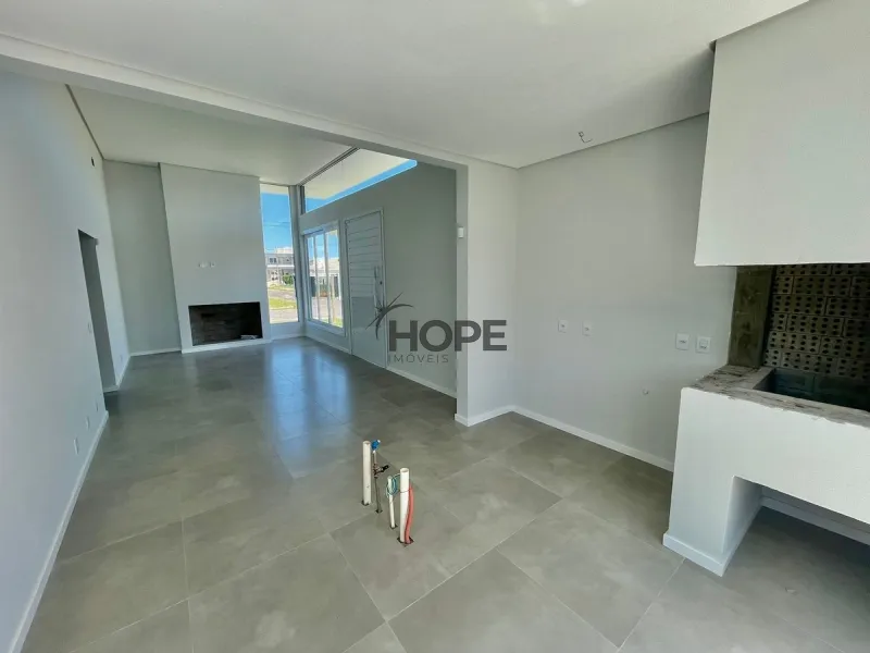 Casa com 3 dormitórios, sendo um suíte em bairro de Capão da Canoa: 4ª foto da galeria de imagens do imóvel