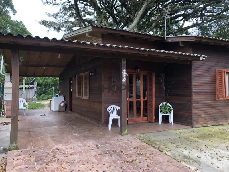 CASA DE MADEIRA COMPOSTA POR 2 DORMITÓRIOS EM XANGRI-LÁ!: 6ª foto da galeria de imagens do imóvel