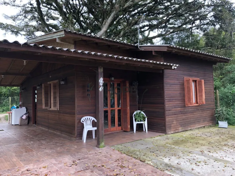 CASA DE MADEIRA COMPOSTA POR 2 DORMITÓRIOS EM XANGRI-LÁ!: 9ª foto da galeria de imagens do imóvel