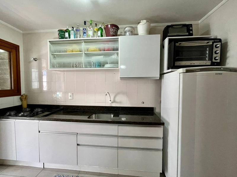 APARTAMENTO 2 DORMITÓRIOS EM CAPÃO DA CANOA/CENTRO: 6ª foto da galeria de imagens do imóvel