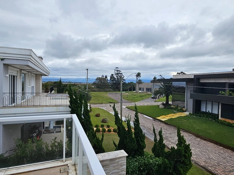 CASA 5 SUÍTES EM CONDOMÍNIO FECHADO/ATLÂNTIDA SUL: 2ª foto da galeria de imagens do imóvel