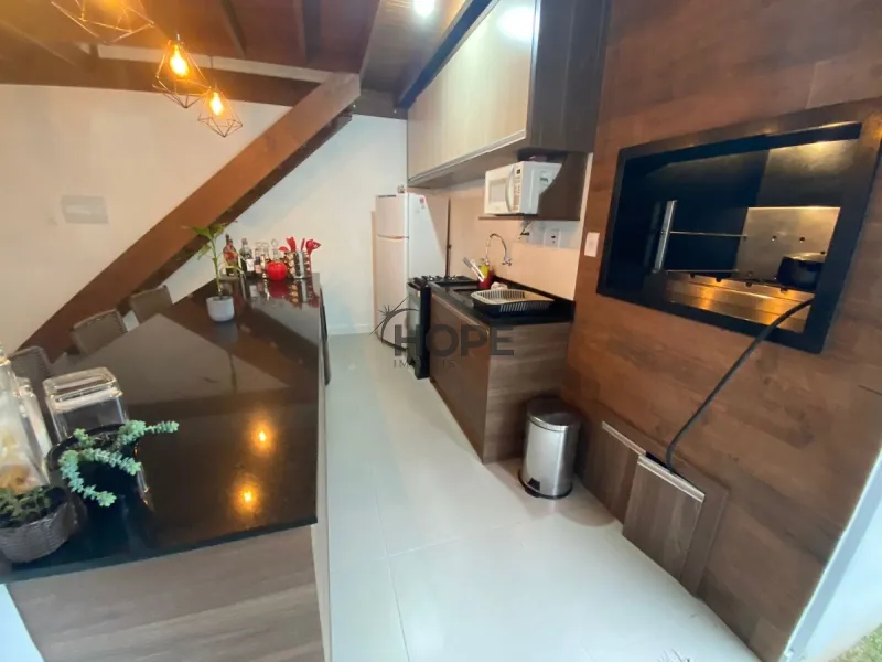 Casa com 4 dormitórios em Capão da Canoa: 3ª foto da galeria de imagens do imóvel