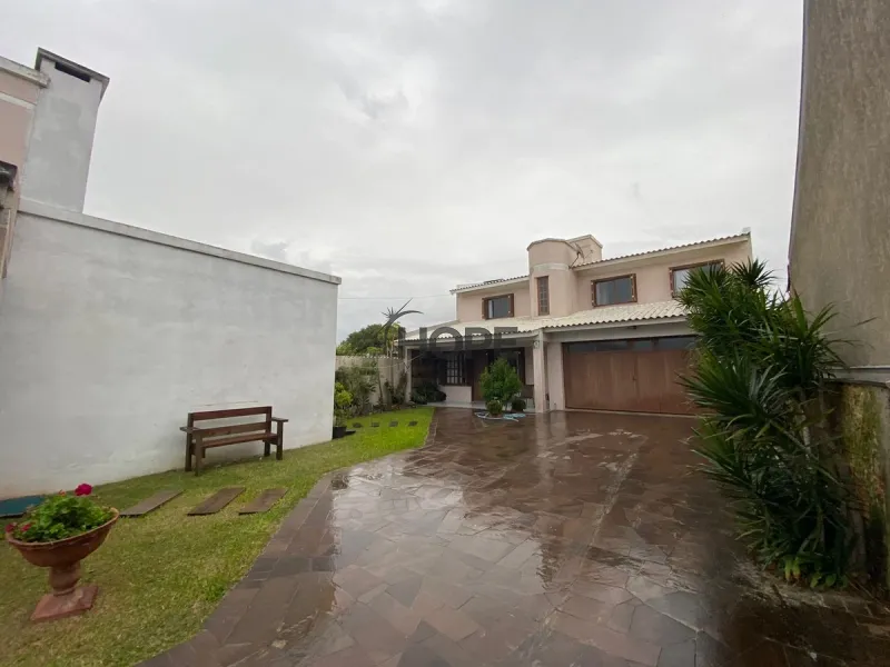 Casa com 4 dormitórios em Capão da Canoa: 11ª foto da galeria de imagens do imóvel