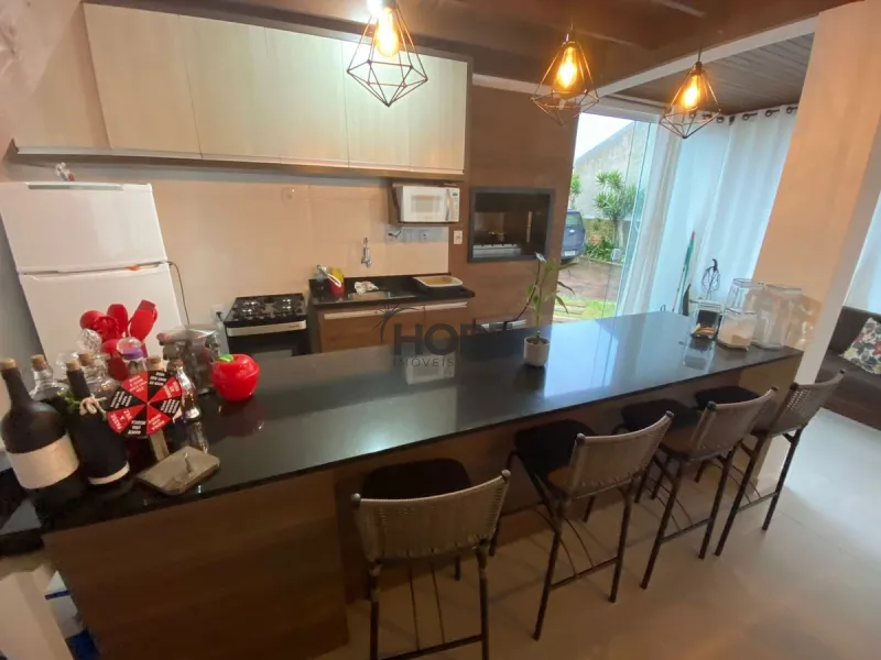 Casa com 4 dormitórios em Capão da Canoa: 4ª foto da galeria de imagens do imóvel