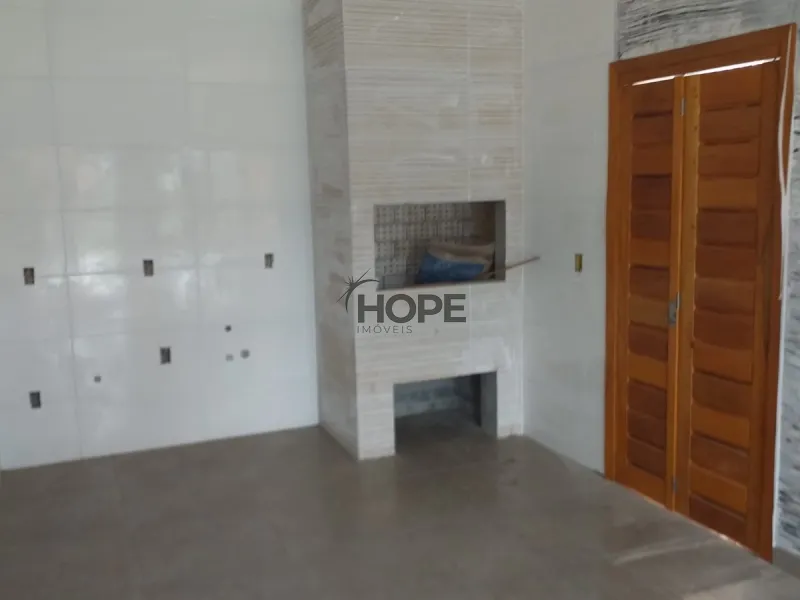 Casa com dois dormitórios e um suíte a venda em bairro de Xangri-lá: 1ª foto da galeria de imagens do imóvel