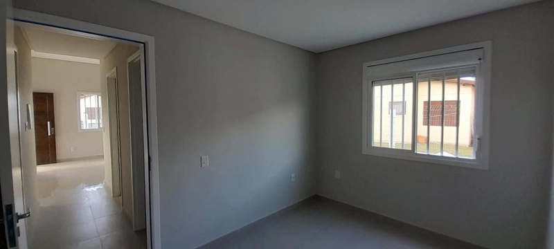 CASA COMPOSTA POR 2 DORMITÓRIOS EM CAPÃO DA CANOA!: 2ª foto da galeria de imagens do imóvel