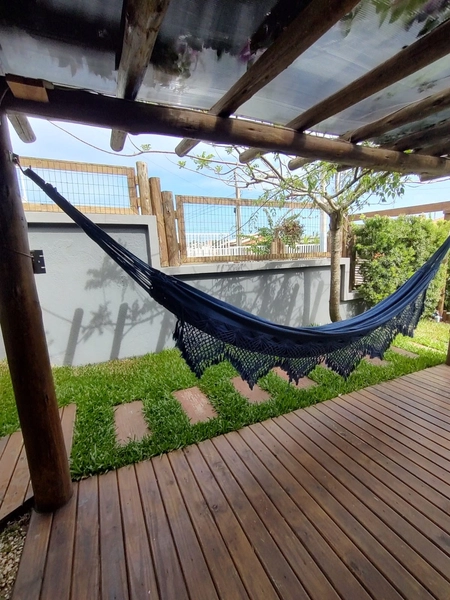 LINDA E ACONCHEGANTE CASA À VENDA EM XANGRI-LÁ: 5ª foto da galeria de imagens do imóvel