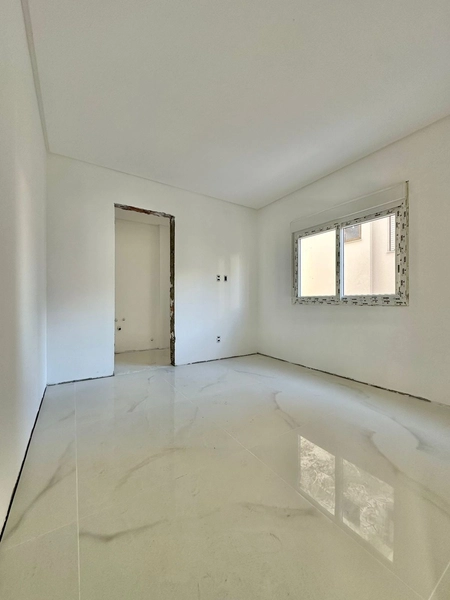 APARTAMENTO EM CAPÃO DA CANOA: 4ª foto da galeria de imagens do imóvel