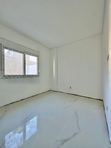 APARTAMENTO EM CAPÃO DA CANOA: 2ª foto da galeria de imagens do imóvel
