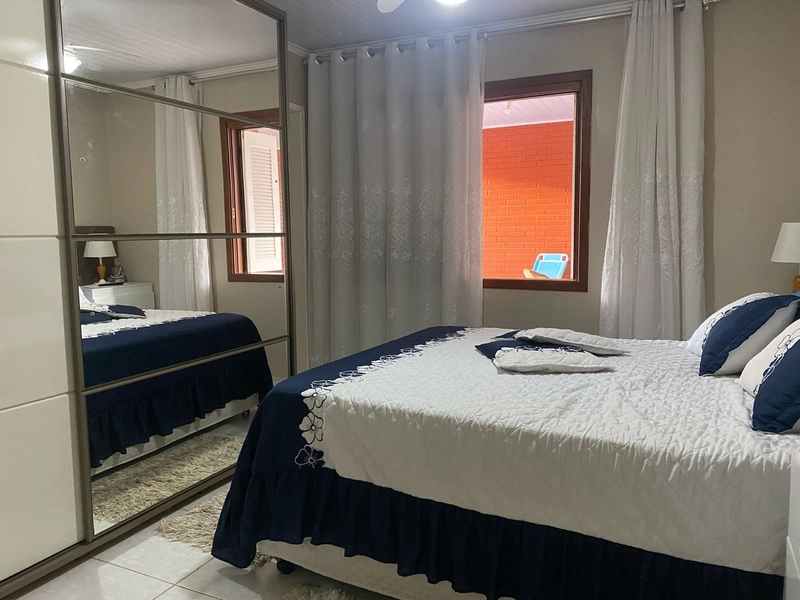 Casa com 3 dormitórios e área de churrasco em bairro  de Xangri-lá: 5ª foto da galeria de imagens do imóvel