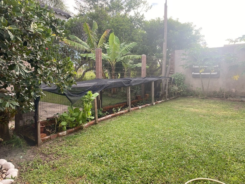 Casa com 3 dormitórios e área de churrasco em bairro  de Xangri-lá: 3ª foto da galeria de imagens do imóvel