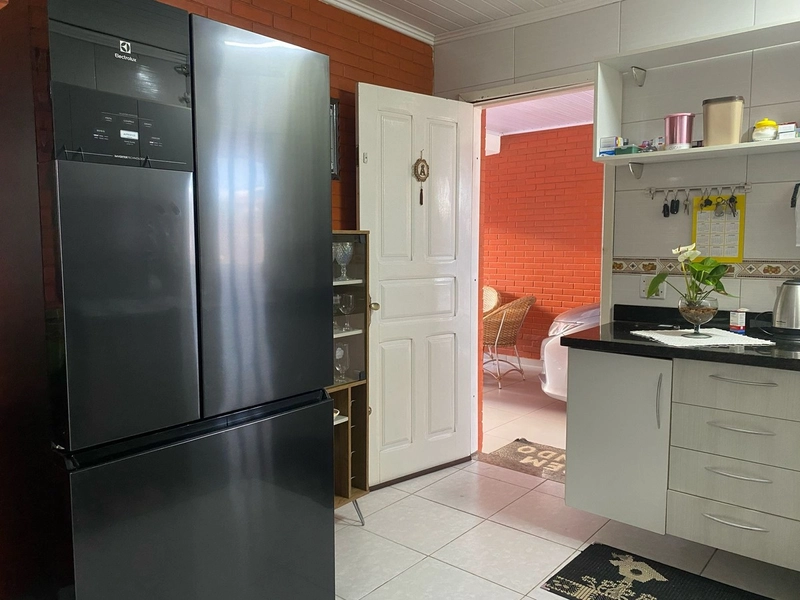 Casa com 3 dormitórios e área de churrasco em bairro  de Xangri-lá: 8ª foto da galeria de imagens do imóvel