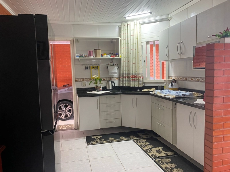 Casa com 3 dormitórios e área de churrasco em bairro  de Xangri-lá: 4ª foto da galeria de imagens do imóvel