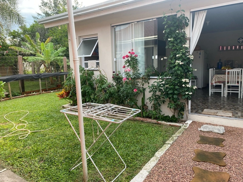 Casa com 3 dormitórios e área de churrasco em bairro  de Xangri-lá: 11ª foto da galeria de imagens do imóvel