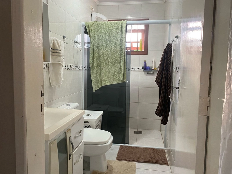 Casa com 3 dormitórios e área de churrasco em bairro  de Xangri-lá: 7ª foto da galeria de imagens do imóvel