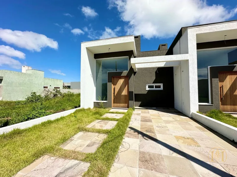 Casa Pertinho do mar no Jardim Beira Mar em Capão da Canoa: 2ª foto da galeria de imagens do imóvel