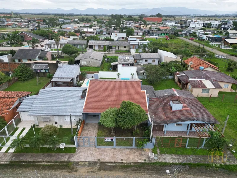 Casa térrea com piscina à venda no Bairro Arpoador, Xangri-lá!: 2ª foto da galeria de imagens do imóvel
