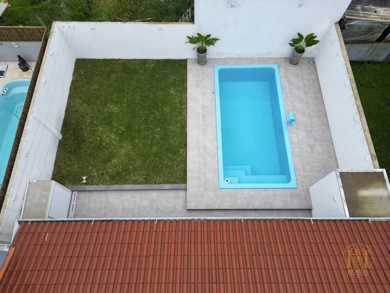 Casa térrea com piscina à venda no Bairro Arpoador, Xangri-lá!: 4ª foto da galeria de imagens do imóvel