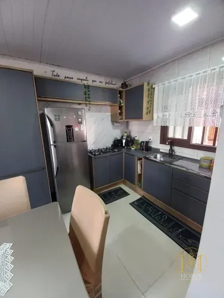 Casa 2 dormitórios de terreno inteiro em CAPÃO DA CANOA: 14ª foto da galeria de imagens do imóvel