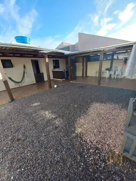 Casa 2 dormitórios de terreno inteiro em CAPÃO DA CANOA: 2ª foto da galeria de imagens do imóvel